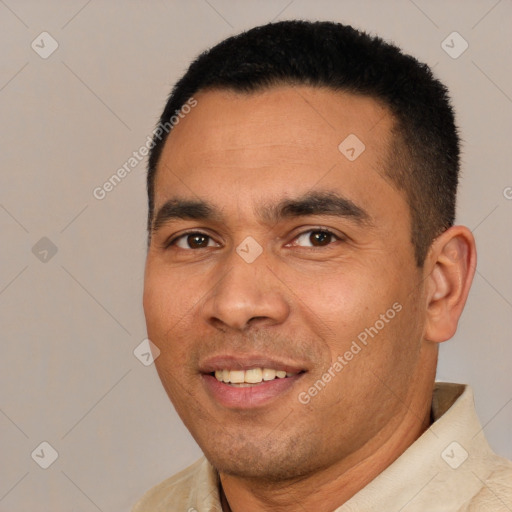 Joyful white young-adult male with short  black hair and brown eyes