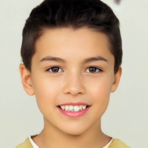 Joyful white child male with short  brown hair and brown eyes