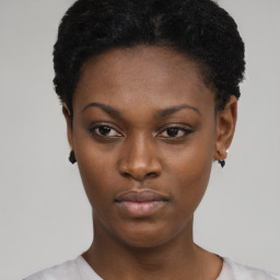 Neutral black young-adult female with short  black hair and brown eyes