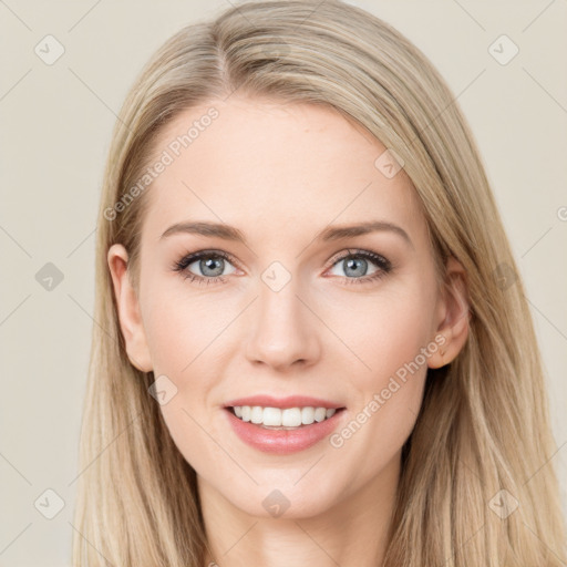 Joyful white young-adult female with long  brown hair and blue eyes