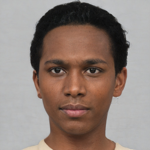Neutral black young-adult male with short  black hair and brown eyes