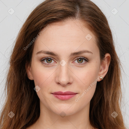 Joyful white young-adult female with long  brown hair and green eyes