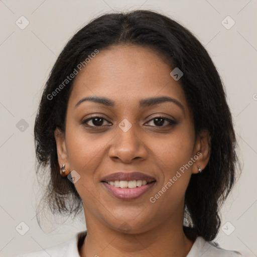 Joyful black young-adult female with medium  brown hair and brown eyes