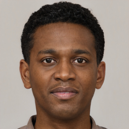 Neutral black young-adult male with short  brown hair and brown eyes