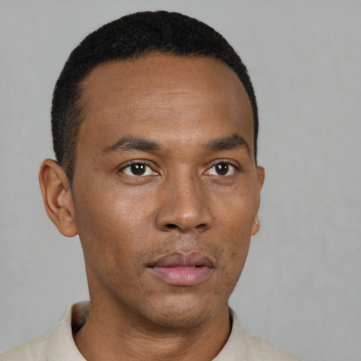 Neutral black young-adult male with short  black hair and brown eyes