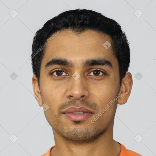 Neutral latino young-adult male with short  black hair and brown eyes
