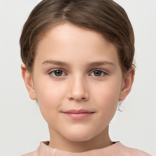 Joyful white child female with short  brown hair and brown eyes