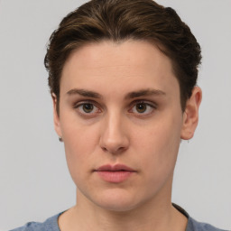 Neutral white young-adult female with short  brown hair and brown eyes