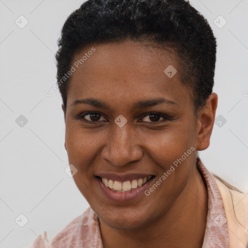 Joyful black young-adult female with short  brown hair and brown eyes