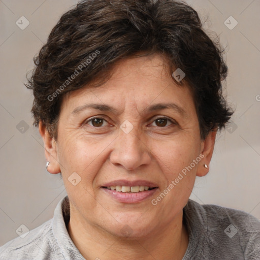 Joyful white adult female with short  brown hair and brown eyes