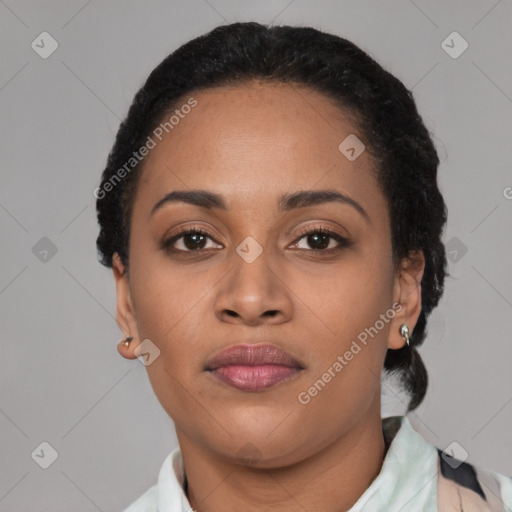 Joyful latino young-adult female with short  black hair and brown eyes