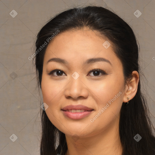 Joyful asian young-adult female with long  brown hair and brown eyes