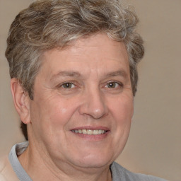 Joyful white middle-aged male with short  brown hair and brown eyes