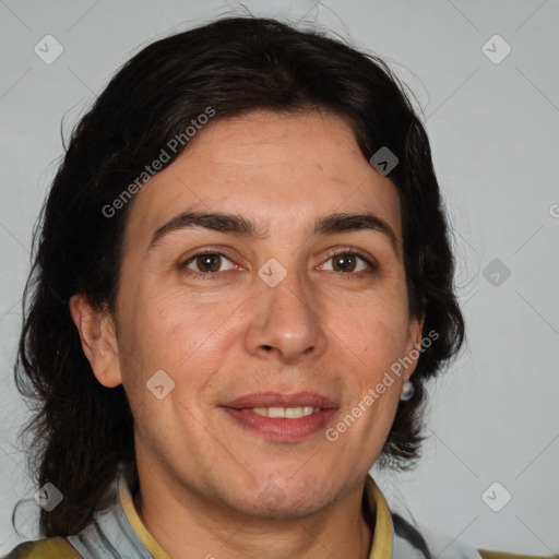 Joyful white adult male with medium  brown hair and brown eyes