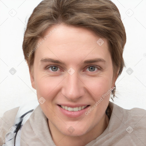 Joyful white young-adult female with short  brown hair and grey eyes