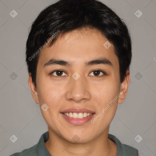 Joyful asian young-adult male with short  black hair and brown eyes