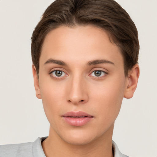 Neutral white young-adult female with short  brown hair and brown eyes