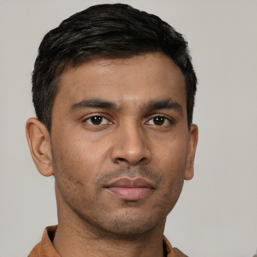 Neutral white young-adult male with short  black hair and brown eyes