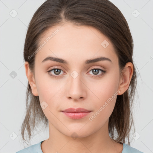 Neutral white young-adult female with medium  brown hair and brown eyes