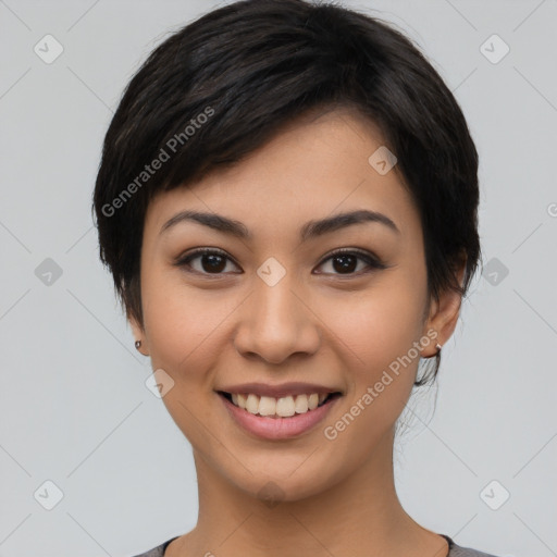 Joyful asian young-adult female with short  black hair and brown eyes