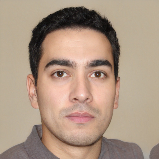 Neutral white young-adult male with short  black hair and brown eyes