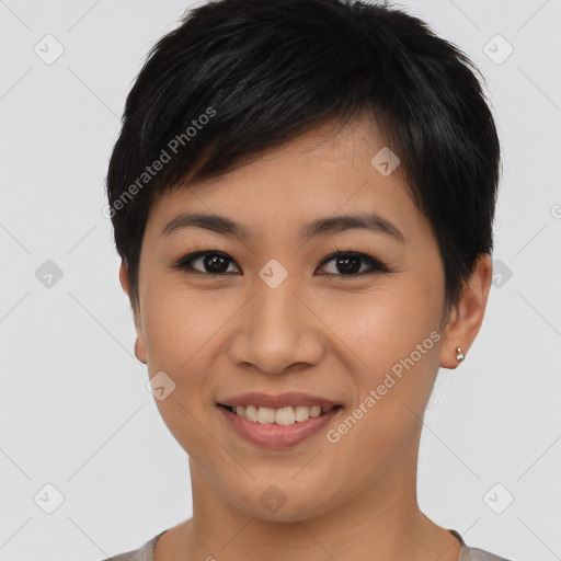 Joyful asian young-adult female with short  black hair and brown eyes