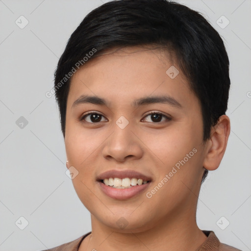 Joyful asian young-adult female with short  black hair and brown eyes