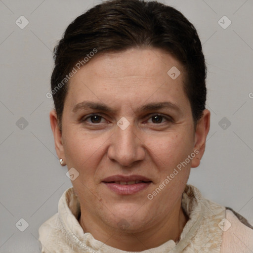 Joyful white adult female with short  brown hair and brown eyes