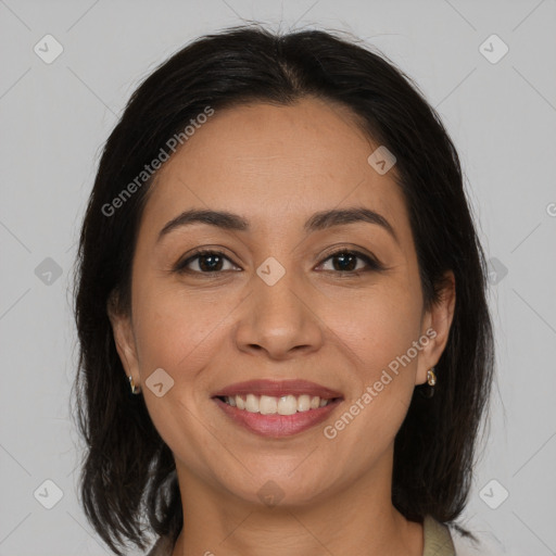 Joyful white adult female with medium  brown hair and brown eyes