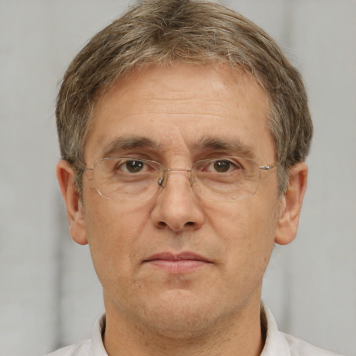 Neutral white middle-aged male with short  brown hair and brown eyes