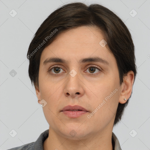 Neutral white young-adult female with short  brown hair and brown eyes