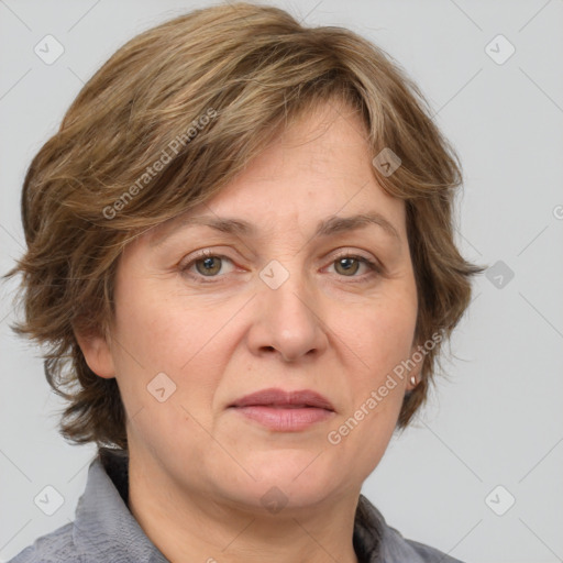 Joyful white adult female with medium  brown hair and grey eyes