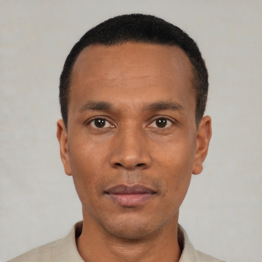 Neutral black adult male with short  black hair and brown eyes