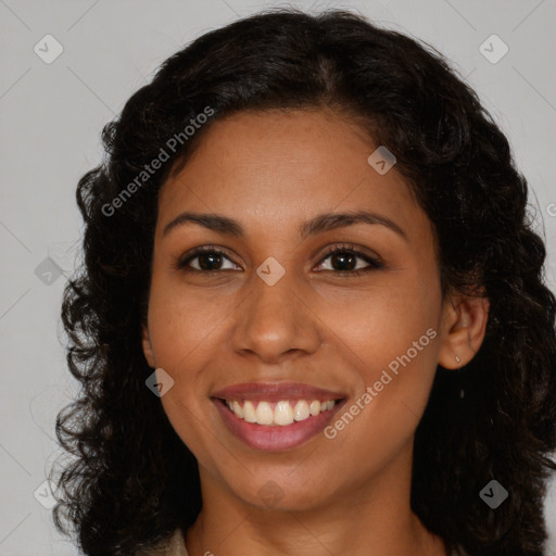 Joyful latino young-adult female with long  brown hair and brown eyes