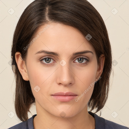 Neutral white young-adult female with medium  brown hair and brown eyes