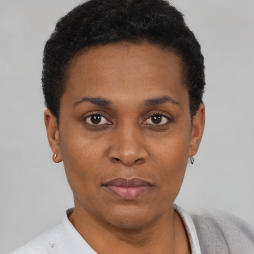 Neutral black young-adult female with short  black hair and brown eyes