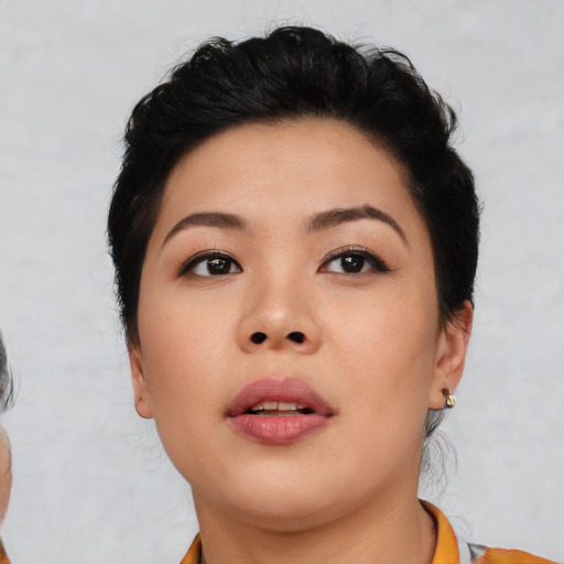 Neutral asian young-adult female with medium  black hair and brown eyes