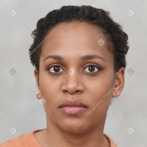 Neutral black young-adult female with short  brown hair and brown eyes