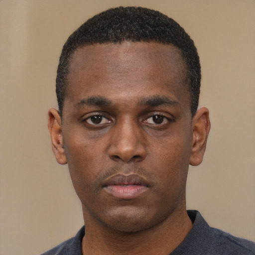 Neutral black young-adult male with short  black hair and brown eyes