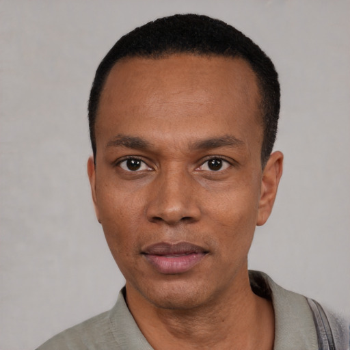 Neutral black young-adult male with short  black hair and brown eyes