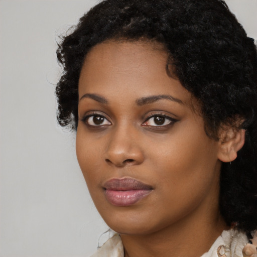 Neutral black young-adult female with long  black hair and brown eyes