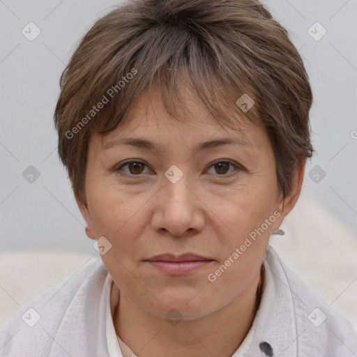 Joyful white adult female with short  brown hair and brown eyes