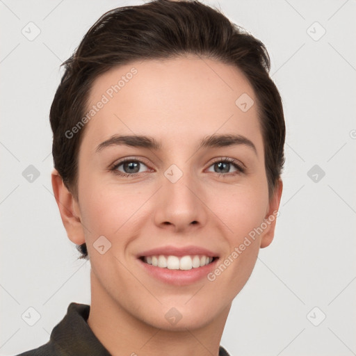 Joyful white young-adult female with short  brown hair and brown eyes