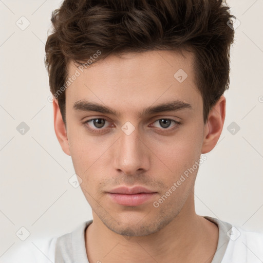 Neutral white young-adult male with short  brown hair and brown eyes