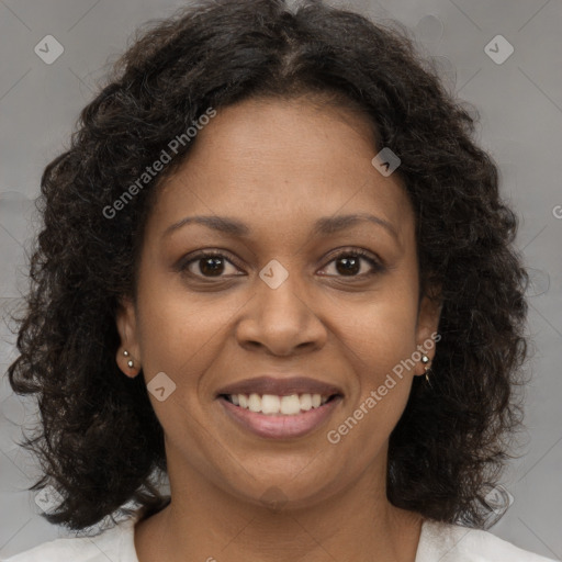 Joyful black young-adult female with medium  brown hair and brown eyes