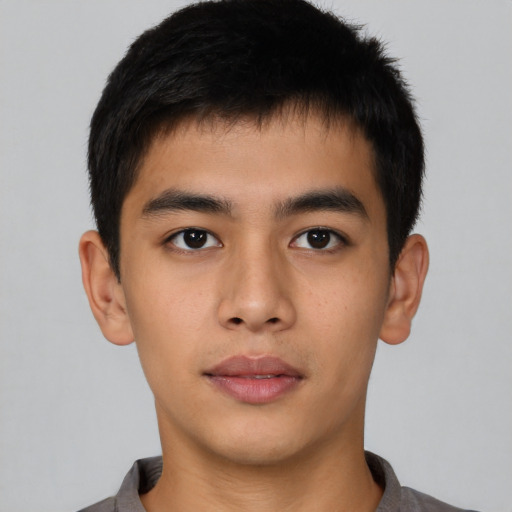 Neutral asian young-adult male with short  black hair and brown eyes