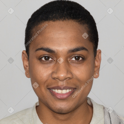 Joyful black young-adult male with short  black hair and brown eyes