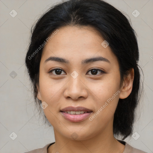 Joyful asian young-adult female with medium  brown hair and brown eyes