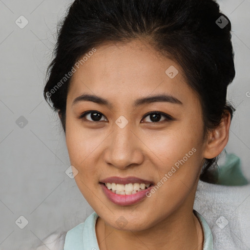 Joyful asian young-adult female with short  brown hair and brown eyes