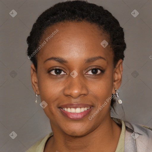 Joyful black young-adult female with short  black hair and brown eyes